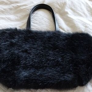 Black Faux Fur Tote Bag with Faux Leather Handles.